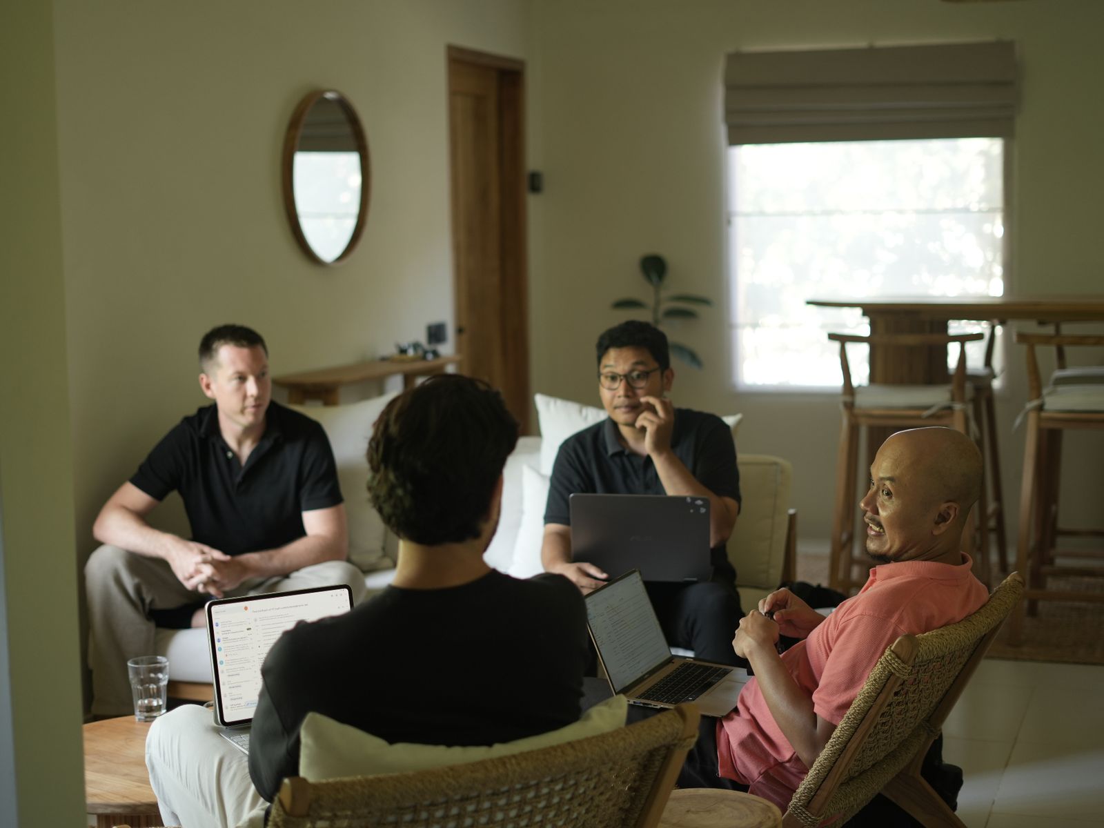 Morris Nelson (left) and Juan (foreground, back to camera), founders of South Developments, in a meeting with the local Lombok accountancy team