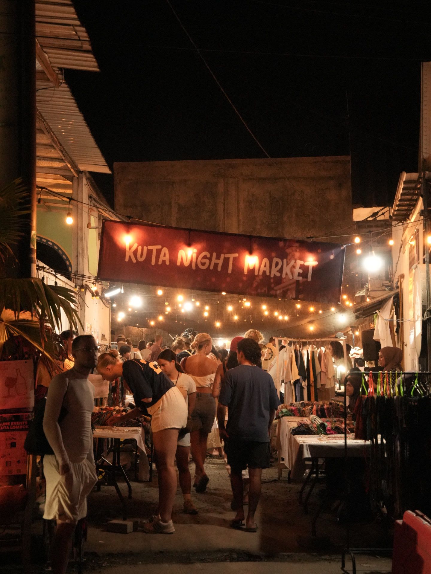 Kuta Night Market in Lombok — string lights, stalls, and visitors browsing after dark